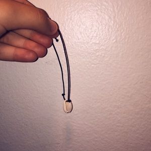 A dangling shell anklet/ bracelet